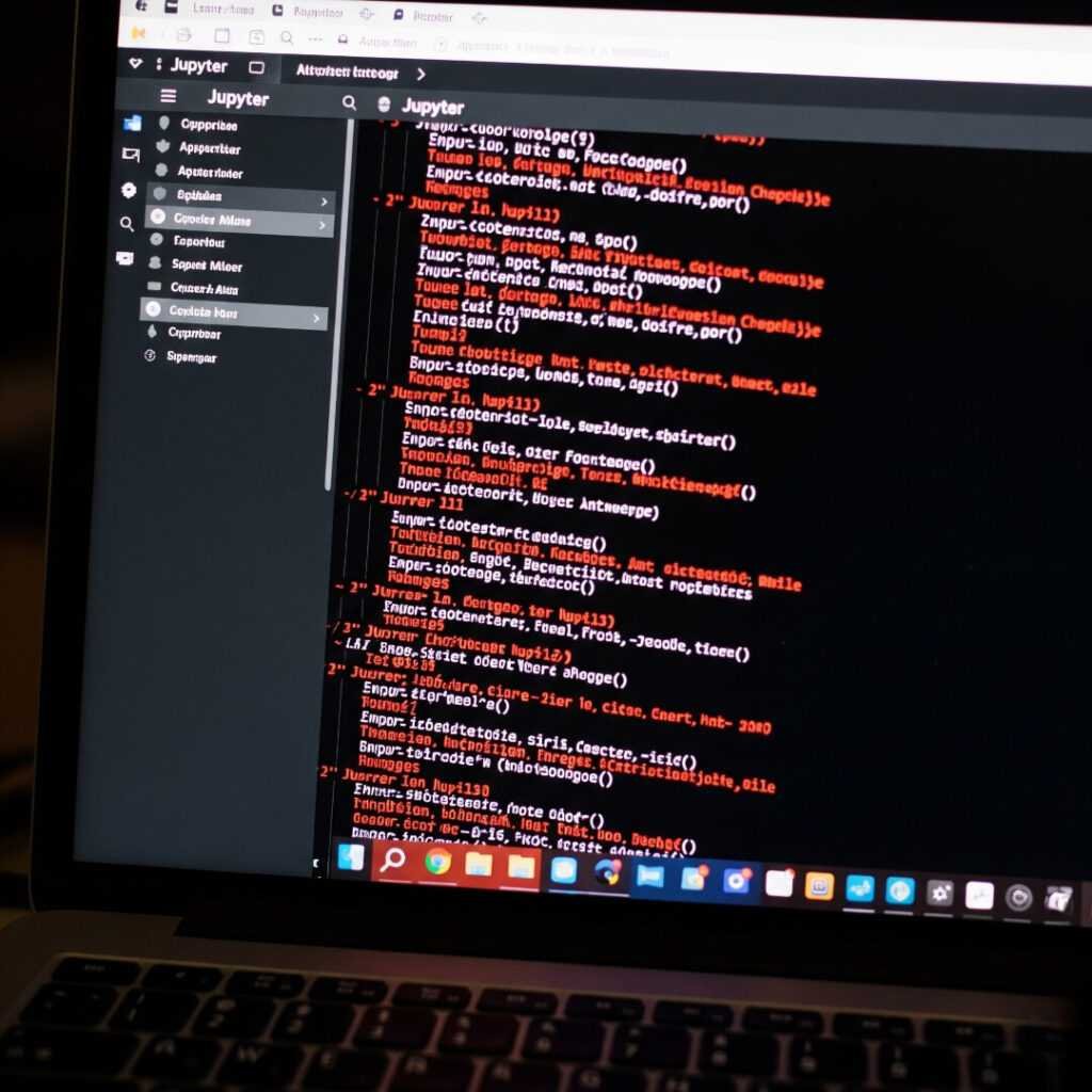Laptop screen showing a Jupyter notebook with errors.