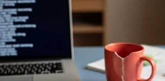 What Google Really Wants from Search Users Messy desk with laptop showing "SEO???" on notebook.